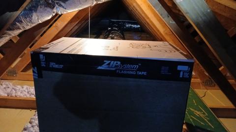 A box was constructed of rigid foam and sheathing tape to insulate this return plenum in the attic.