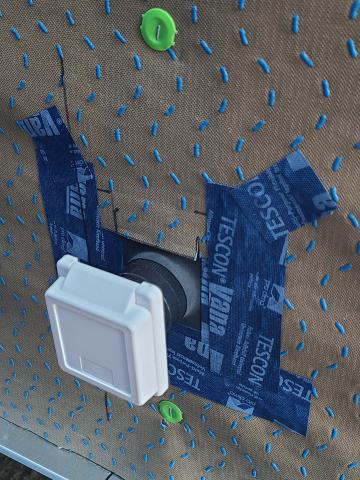 Right - External outlet wall penetration is flashed with tape that is properly layered with house wrap.