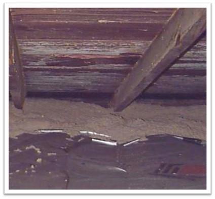 Mold on the sheathing in this attic occurred after attic ventilation was increased