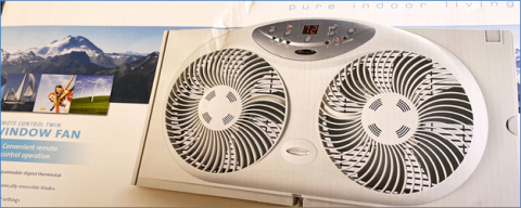 A reversible window fan can operate via thermostatic or remote control and can selectively exhaust air or bring in outdoor air