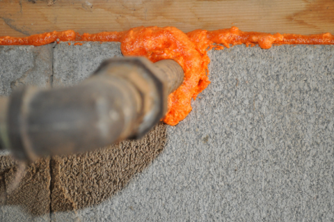 Right - This opening in the foundation wall around this pipe was filled with wire mesh then sealed with spray foam to prevent rodent and insect entry