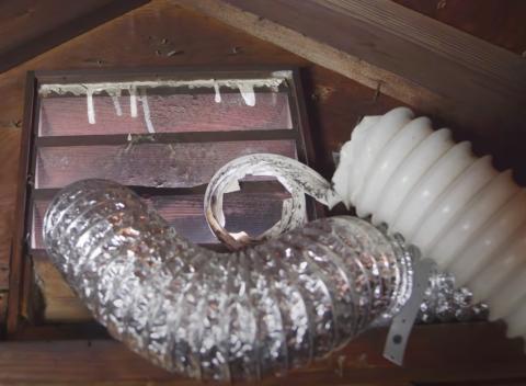 The exhaust ducts use gable end vent- the foil duct exits the vent but likely does not have a proper terminating vent with grill; the corrugated plastic vent does not go outside. Smooth metal ducts, rather than corrugated, provide best air flow