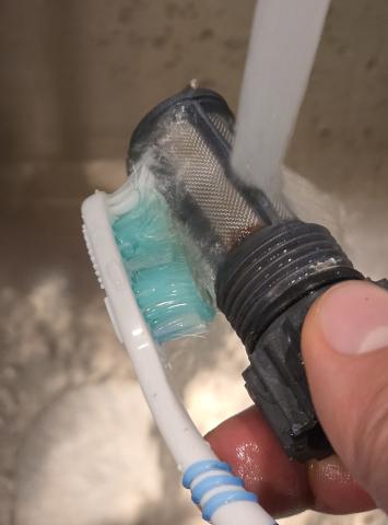 An old toothbrush works great for cleaning the inlet water filter on a tankless water heater.