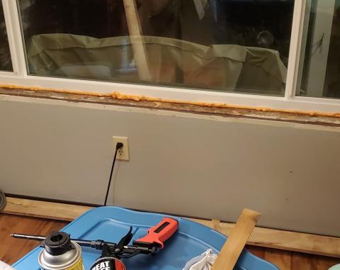 Canned spray foam can be used to air seal the rough opening around the windows