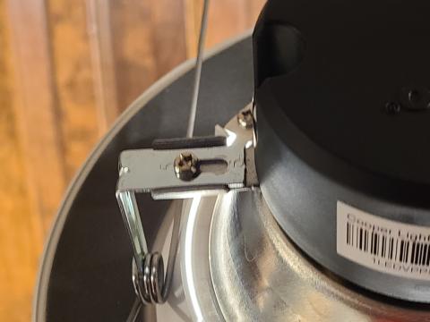 Some LED retrofit recessed light fixtures include sliding adjustments to adjust the spacing of the spring clips that will hold the new kit in the old can light housing 