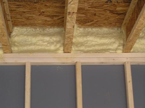 Spray foam insulates the rim joist and air seals the subfloor-rim joist and rim joist-top plate connections