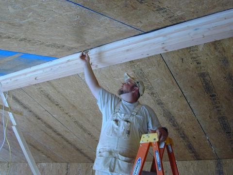 Use a smoke pencil to check for air leaks at SIP panel seams, especially along the ridge beam