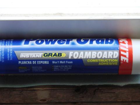 Adhesive caulk is used to seal seams and attach the multiple layers of rigid insulation