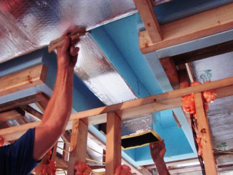Run-out ducts are installed over partition walls