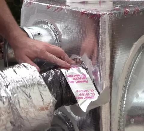 Tape the flex duct core to the take-off collar using UL-181 foil mastic tape.