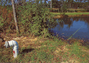 This dry hydrant was installed by a homeowner living in a rural location to provide firefighters with easy access to this natural water source located on their property.