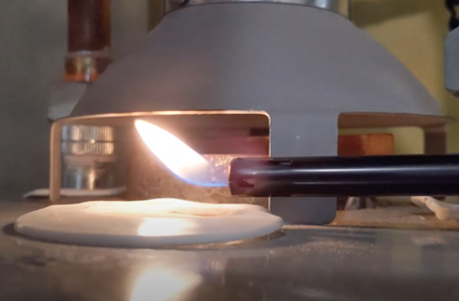 Use a long stick lighter or incense stick to see if an ambient draft gas water heater is backdrafting