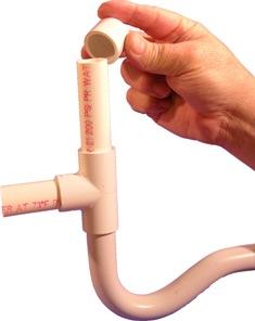 The drain pipe should include a trap and a clean-out with a removable cap