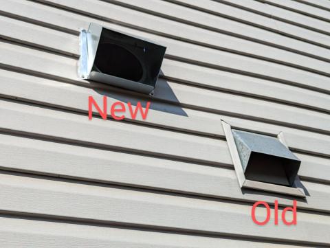 The “old” exhaust fan vent on the right was installed before or during the siding installation and is likely properly flashed- the “new” exhaust fan on the left was installed after the siding was installed and relies on caulking to keep water out