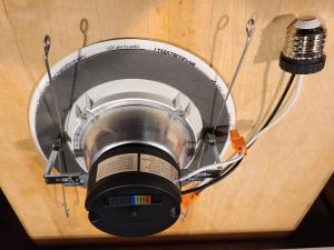 The grey ring around the back of this LED retrofit ceiling fixture trim kits is a foam gasket to air seal the fixture. 