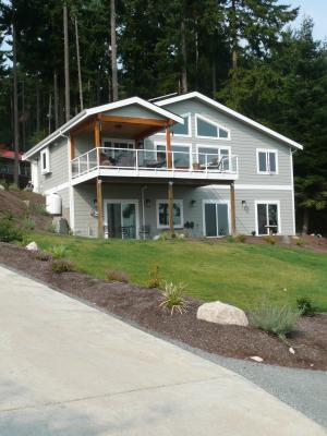 Clifton View Homes built this custom home in the marine climate in Coupeville, WA, and certified it to DOE Zero Energy Ready Home specifications in 2015. 