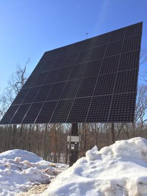 This 13.8-kW array of solar panels is mounted on a steel pole with motorized dual-axis rotation to track the sun, maximizing electrical power generation.  