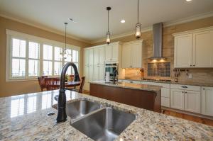 Low-flow water fixtures save energy and water in the kitchen and bath. 