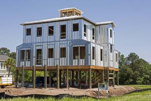 This coastal home was built on a flood-resistant pier foundation using hurricane- and moisture-resistant expanded polystyrene and steel wall panels and hurricane strapping. 