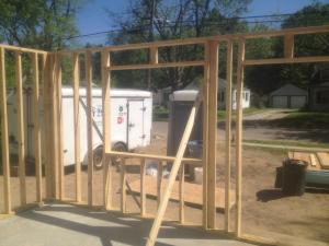Headers over windows on non-load-bearing walls are open to allow room for insulation.