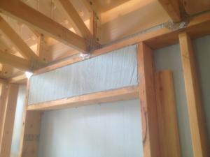 Headers over windows and doors are insulated rather than solid wood.