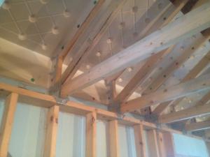 Right - Raised-heel roof trusses allow more room at the eaves for attic insulation.