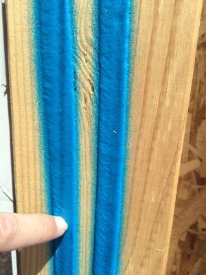 Before installing drywall, contractors install two beads of a sprayer-applied elastomeric sealant along framing and top plates to forma a flexible, air-tight seal between the framing and dry wall.