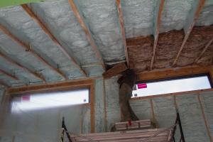 This vaulted ceiling has 7 inches of closed-cell spray foam plus an R-22 unfaced mineral wool batt for a total attic insulation value of R-68.