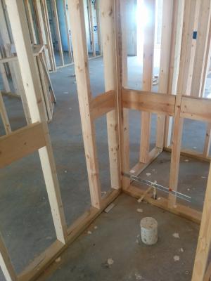 Solid wood blocking was installed in the walls to accommodate future grab bars in both bathrooms. 