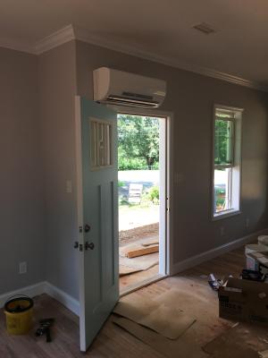 Wrong – This ductless mini-split heat pump was installed above an exterior door allowing conditioned air to escape when the door is opened, heat transfer through the door, and temperature fluctuations that could impact the unit’s thermostat. 