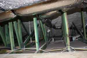 Wrong – These flex ducts are pulled taut, which is correct but they are inadequately supported with straps that are spaced too far apart and are too tight causing pinching of the insulation and turns are sharp rather than gradual. 