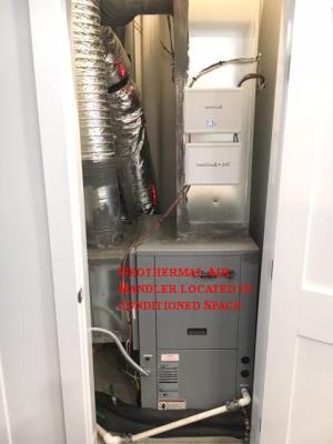 Right - The air handler for this geothermal heat pump is located in conditioned space.  