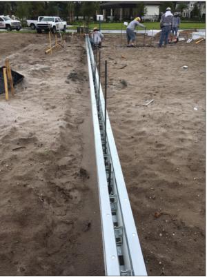 Metal-reinforced rigid foam panels create a form for the concrete foundation walls.