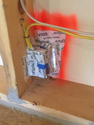 Electrical boxes are sealed with air sealing tape.
