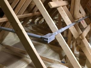 The seams in the ceiling drywall are sealed from the attic side with spray foam.
