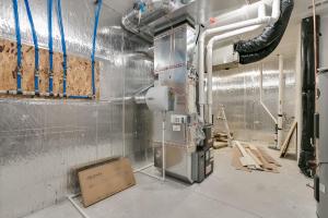 Right – This sealed combustion gas furnace has a fresh air intake with an electronically controlled damper.