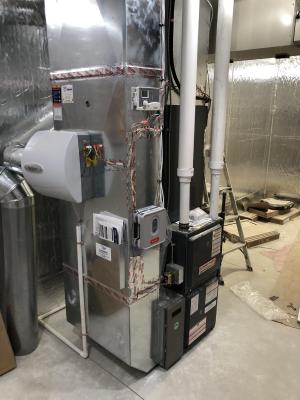 Right – All of the cabinet seams in this HVAC air furnace are sealed with an approved metal tape.