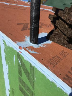 Right – All penetrations through the roof decking are sealed with paint-on flashing.