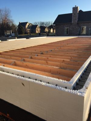 Right – 11-inch ICFs provide R-50 of wall insulation from the footing to the roof on this cold-climate home.