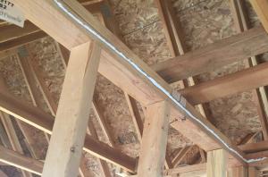 Right – A bead of sealant will form an airtight gasket between the top plate and drywall.