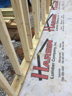 Right – Staggered 2x4s are placed every 12 inches on 2x6 plates, providing a nailing surface on each side of the wall every 24 inches.