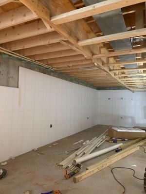 Right – A termite inspection gap is left at the top of the rigid foam board basement wall insulation.