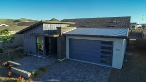 Mandalay Homes built this production home in the mixed-dry climate in Prescott, AZ, and certified it to DOE Zero Energy Ready Home specifications in 2019. 