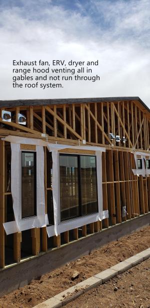 Right – The builder routed all vents through side walls to avoid holes in the roof.