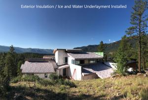 Right – A fully adhered roof membrane provides thorough water and wind protection in this mountain top location.