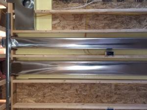Right – Rigid foam is installed behind HVAC ducts to provide additional insulation to the ducts which are installed within the conditioned space.