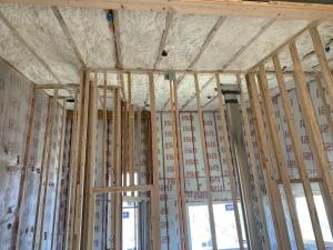 Right – Spray foam fills the cathedral ceilings of the home.