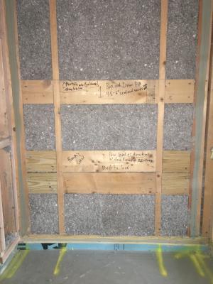 Right – Blocking was installed in the walls behind the tub for installation of grab bars.