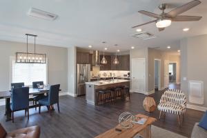 Right – The ductless minisplit in this open area is installed in the ceiling rather than on a wall.