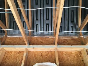 Right – Netting will prevent blown insulation from blocking the soffit vents.